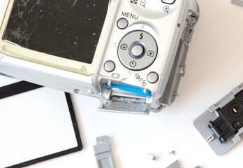 Broken old digital camera isolated, obsolete and not in use anymore