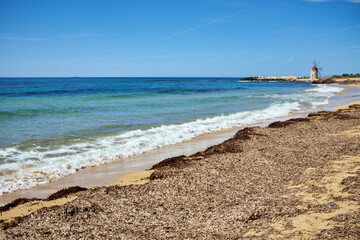 the beach of Erice mare in Trapani with the Windmills on the bottom