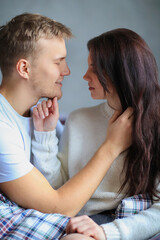 Fototapeta premium The couple is relaxing at home on a beautiful day and shooting