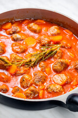 meat balls in tomato sauce with carrot