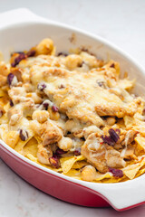 nachos with chicken meat, red beans and cheese