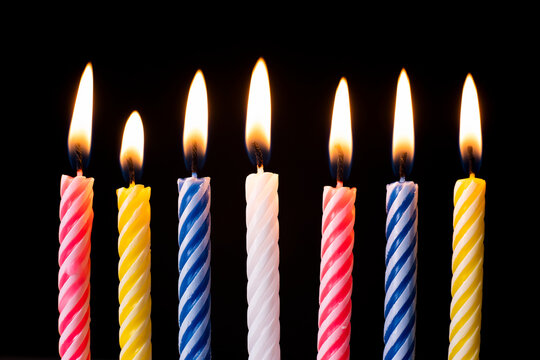 Collection set of birthday candles on black background, anniversary celebration concept, blowing off light,making a wish