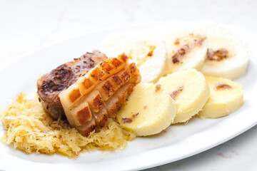 traditional Czech cuisine pork with cabbage and dumplings