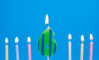 Burning birthday cake candle number 6. Happy Birthday background anniversary celebration concept