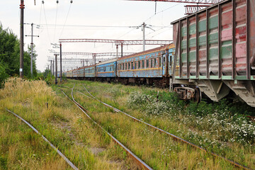 Fototapeta na wymiar Transport - old Freight and passenger railroad cars train