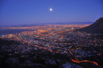 Night city and moon