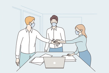 Fototapeta premium Success, cooperation, teamwork during covid-19 concept. Young business partners workers in face medical masks shaking hands meaning agreement in office during pandemic vector illustration 
