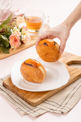 A bombolone or bomboloni is an Italian filled doughnut and is eaten as a snack food and dessert. This Bomboloni has many flavors like strawberry, chocolate, blueberry, etc.