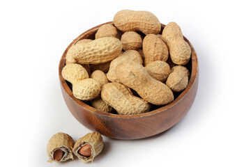 Fresh shelled peanuts in bamboo plate