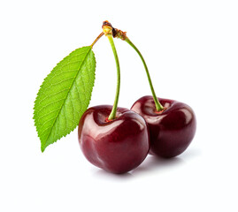 Two sweet cherry with leaves