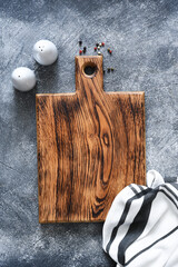 Table setting. Kitchen wooden board with a napkin with a place for the text. Recipe. View from above.