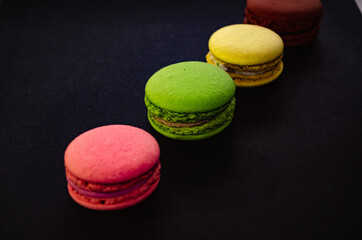Colorful macarons cakes. Small French cakes. Sweet and colorful french macaroons.
