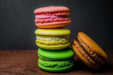 Colorful macarons cakes. Small French cakes. Sweet and colorful french macaroons.