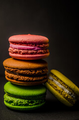 Colorful macarons cakes. Small French cakes. Sweet and colorful french macaroons.