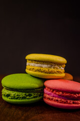 Colorful macarons cakes. Small French cakes. Sweet and colorful french macaroons.