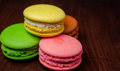 Colorful macarons cakes. Small French cakes. Sweet and colorful french macaroons.