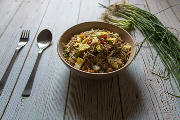 Chinese cuisine fried rice in a bowl. Close up.
