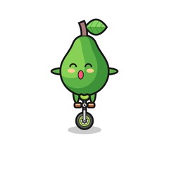 The cute avocado character is riding a circus bike