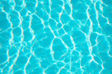 Clear water in outdoor swimming pool on sunny day