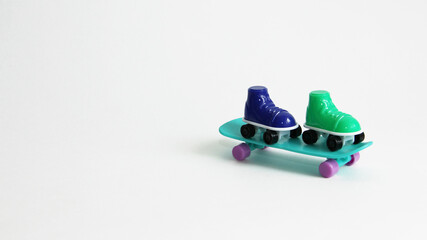 
roller skates while standing on a skateboard.roller skates of different colors and skate.summer sports skate and roller skates or roller skates