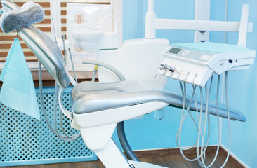 Dentist's chair. Modern equipment for dental treatment. Interior of a modern medical clinic