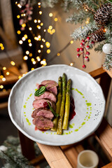 Wagyu steak with asparagus top view