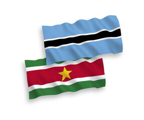 Flags of Republic of Suriname and Botswana on a white background