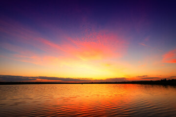 Obraz premium Beautiful landscape with sunset, sunrise on the lake