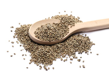 Hemp seeds in wooden spoon isolated on white background