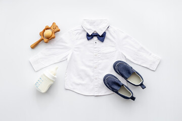 Bodysuit shirt and shoes for baby boy. Baby flat lay background