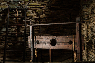 Vintage medieval Torture Equipment in museum, Rack, break-knee, Torture chamber in medieval gothic castle Bezdez, ancient fortress, fairytale stronghold, North Bohemia, Czech Republic - obrazy, fototapety, plakaty