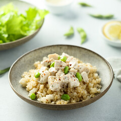 Healthy quinoa bowl with chicken and edamame beans