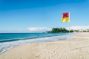Greenmount headland with lifeguard flag on the Gold Coast