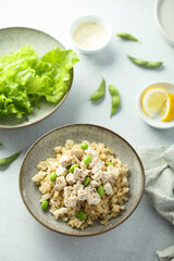 Healthy quinoa bowl with chicken and edamame beans