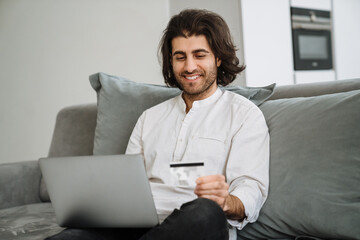 Smiling mid aged brunette turkish man