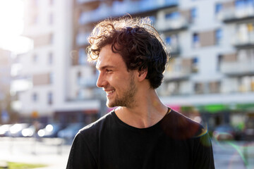 Portrait of a handsome young man in the city
