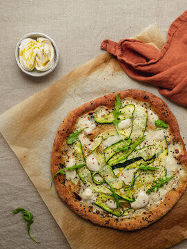 Delicious Pizza With Zucchini Slices On Melted Mozzarella Cheese