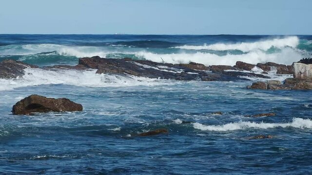 Atlantic ocean waves breaking off the coast of the Cape of Good Hope, Cape Point, South Africa.