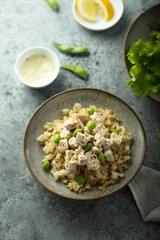 Healthy quinoa bowl with chicken and edamame beans