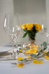 Table design for dinner. A romantic table decorated with roses.
