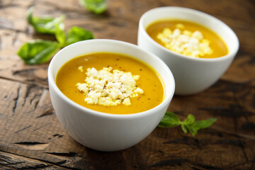 Healthy homemade pumpkin soup with cheese