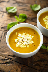 Healthy homemade pumpkin soup with cheese