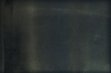 Old dark grunge background. Grain texture