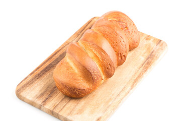 Bread loaf on a wooden chopping board
