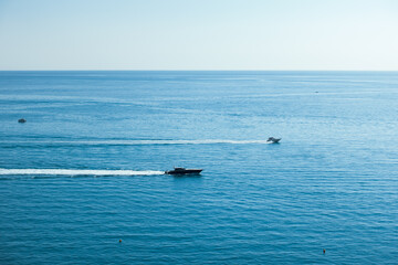 Obraz premium Nature scenic landscape with luxury sailing yacht. Beautiful mediterranean sea in sunny summer day. Perfect tourist place for sailing. Tourist on summer holiday vacation trip. High quality photo