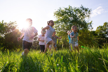 children play outdoors running and having fun