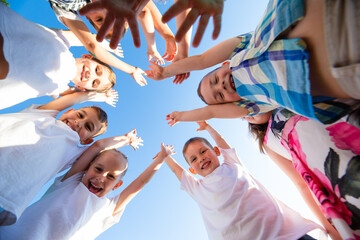 children play outdoors running and having fun