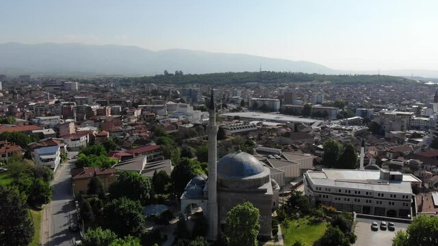 Drone view of the Mustafa Pasha Mosque in Skopje. The marble mosque filmed with a drone. The main mosque in Skopje, North Macedonia. Panoramic view from a drone to the city of Skopje.