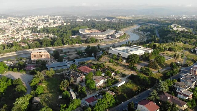 Panoramic drone view of the stadium in Skopje, the capital of North Macedonia. Skopje City Stadium. Drone view of the longest river Vardar in North Macedonia.