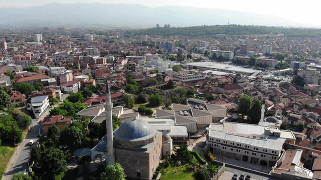 Drone view of the Mustafa Pasha Mosque in Skopje. The marble mosque filmed with a drone. The main mosque in Skopje, North Macedonia. Panoramic view from a drone to the city of Skopje.